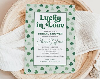 May include: A green shamrock patterned bridal shower invitation with the text "Lucky in Love" and the bride-to-be's name "Clover O'Brien". The invitation includes the date, time, and location of the shower, as well as the bride-to-be's registry information.