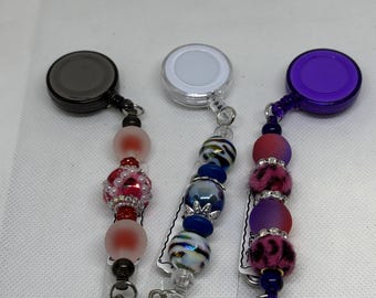 Badgehaspel met kralen