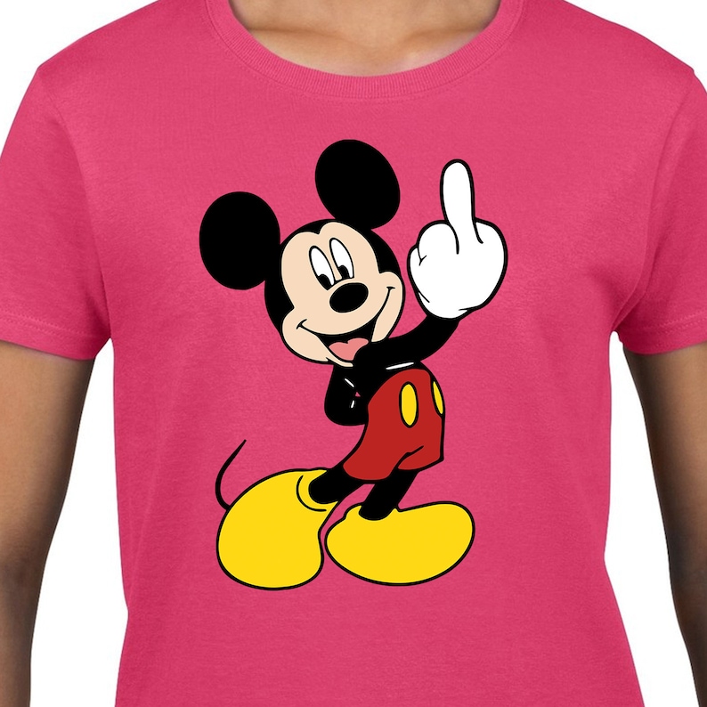 May include: A pink t-shirt featuring a cartoon image of Mickey Mouse giving the middle finger.