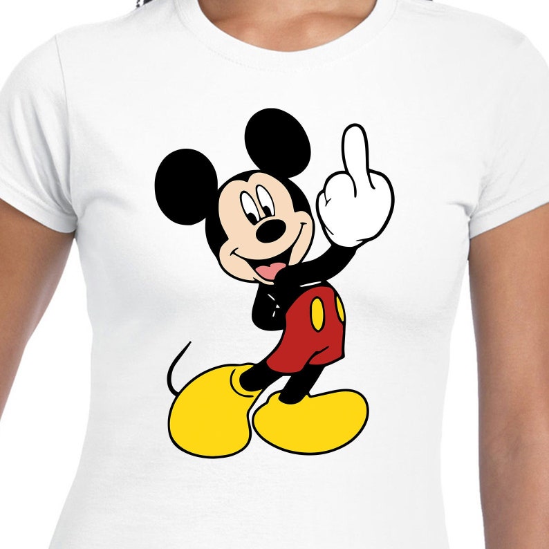 May include: White t-shirt featuring a cartoon image of Mickey Mouse giving the middle finger.