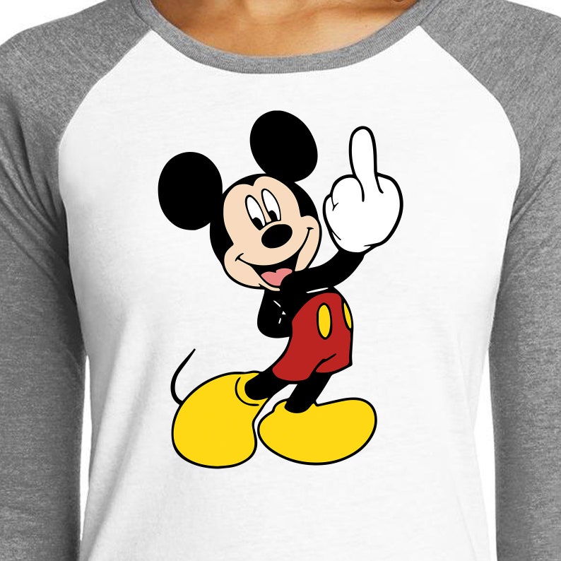 May include: A cartoon image of Mickey Mouse giving the middle finger. Mickey is wearing his signature red shorts with yellow buttons and black shoes. He is smiling.