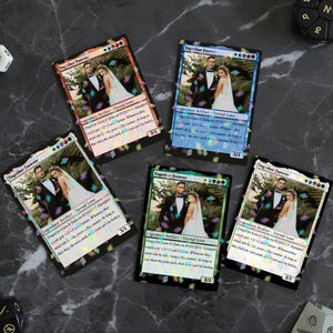May include: Five custom Magic: The Gathering cards featuring a wedding photo of a couple. Each card has a different colored border and the text "Together Forever" at the top. The cards are labeled "Legendary Artifact - Eternal Love".