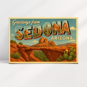 May include: A vintage postcard depicting a landscape of Sedona, Arizona. The image shows red rock formations, cacti, and the text "Greetings from Sedona Arizona" in a retro style. The postcard has a yellowed, aged appearance.
