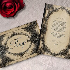 May include: Two vintage-style wedding invitation cards with ornate black and white floral designs. The card on the left says "RSVP" and the card on the right has details about the wedding, including the dress code: "Black Tie".