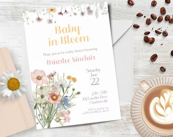 May include: A baby shower invitation with a floral design. The invitation reads "Baby in Bloom" and includes the name "Briarlee Sinclair". The event is scheduled for Saturday, June 22nd at 230-500, 102 Lascelles Drive, Charlotteville. RSVP by June 15th.