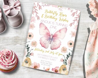 May include: A pink and white butterfly birthday invitation with floral accents. The invitation reads "Butterfly Kisses & Birthday Wishes Anouk is turning one Saturday 2nd July at 2pm 247 Farrington Way Camberley, Surrey RSVP to Molly on (23) 456 7890 by 25th June"
