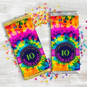 May include: Two colorful tie-dye chocolate bar wrappers with gold foil accents. The wrappers feature a blue circle with the text "Thank you for coming to Sophie's 10th Party".