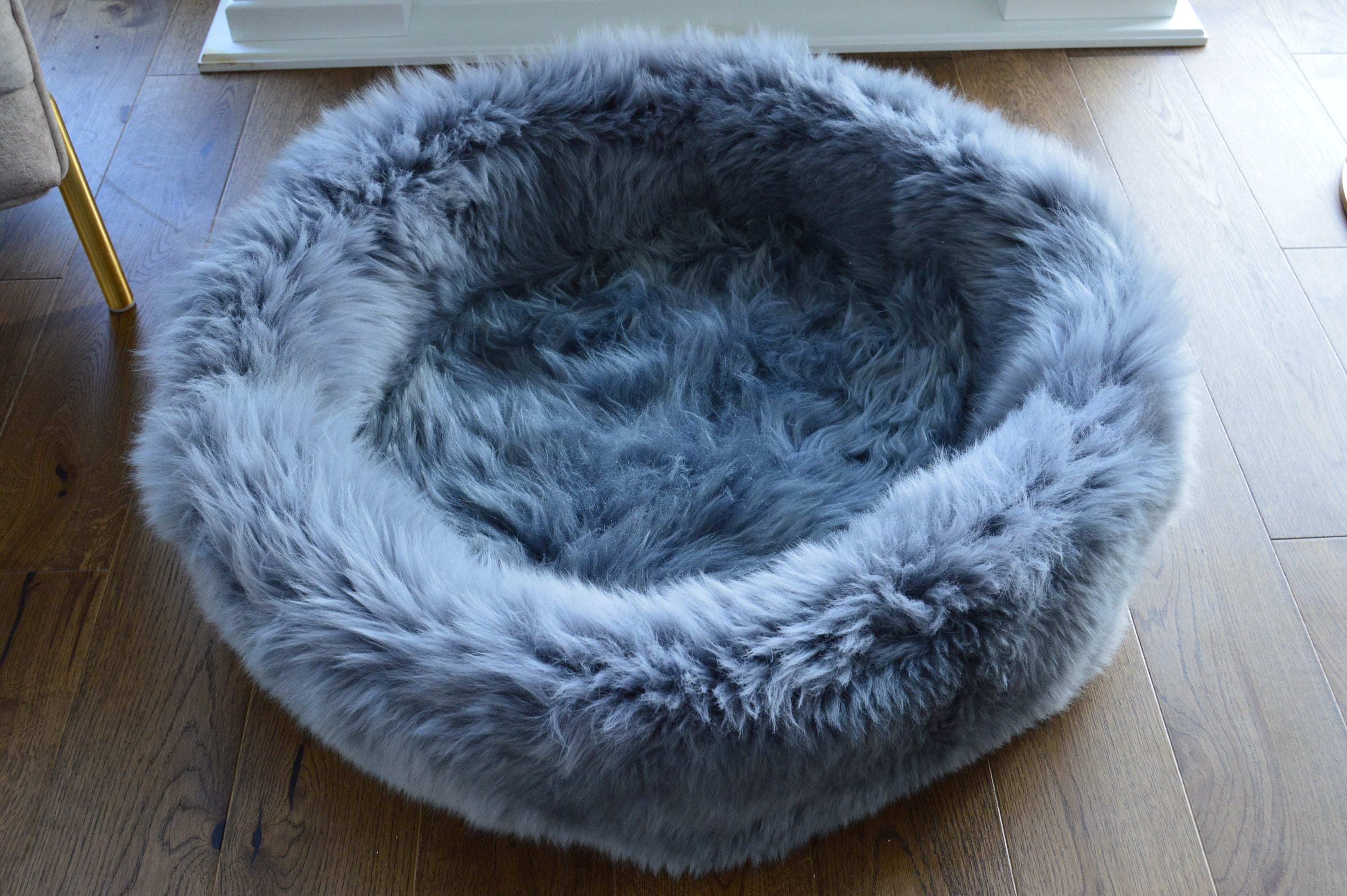 gray fluffy dog bed