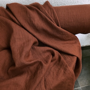 Rust/Saddle Brown/Terracotta 100% Linen fabric 205gsm, 145cm/58inches wide. Medium weight,densely woven,prewashed,softened.