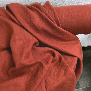 Burnt Sienna/Red Terracotta 100% Linen fabric 205gsm, 145cm/58inches wide. Medium weight,densely woven,prewashed,softened.