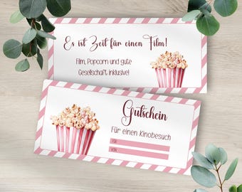 May include: Two pink and white striped movie gift certificates with text and watercolor popcorn illustrations. One certificate reads "It's time for a movie!" and the other says "Gift Certificate for a movie visit."