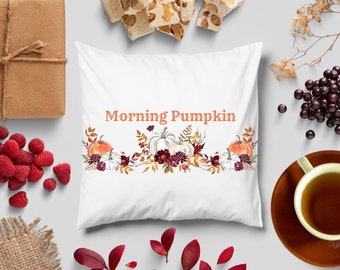 May include: White pillow with the text "Morning Pumpkin" printed in orange. The pillow features a watercolor design of pumpkins, fall leaves, and flowers.