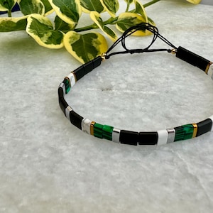 Tila bracelet - green malachite, howlite, and black and gold hematite