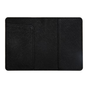 May include: Black leather passport holder with multiple card slots and a flap closure.