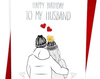 May include: A white card with black text that reads "Happy Birthday to My Husband". The card features a black and white illustration of a couple wearing winter hats and holding coffee cups. There are two red glitter hearts above the couple.