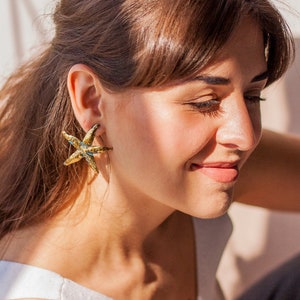 Gold brass designer starfish earrings. Handmade metalwork hammered star studs. Summer tropical nautical mermaid earrings, nature lover gift. image 2
