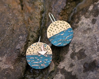 Mismatched mixed metal brass and copper earrings. Starry night ocean wanderlust earrings. Artsy unique nautical bold and colorful earrings.