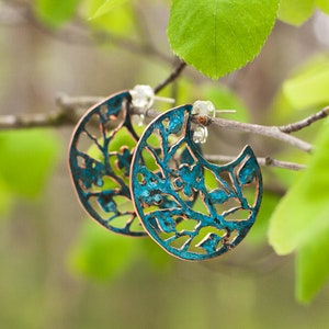 Aesthetic dark blue filigree sakura earrings. Metal lace cherry blossom tree hoops. Unique colorful oxidized copper forest earrings. image 1