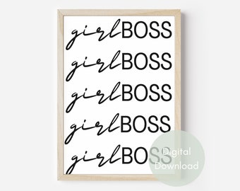 May include: A framed print with the words "girl BOSS" repeated five times in a black, handwritten-style font on a white background. The print is in a light wood frame. A digital download graphic is in the bottom right corner.
