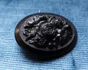 Antique mourning brooch. Bereavement jewellery. Damaged Victorian Gutta Percha floral pin