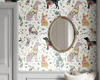 May include: Wallpaper featuring a repeating pattern of dogs in various colors, each adorned with floral designs. The background is white with green foliage and branches. An oval gold mirror hangs on the wall.