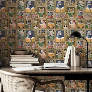May include: Wallpaper featuring framed illustrations of animals reading books. The animals include a dog, pigeon, tiger, elephant, monkey, and cat. The illustrations are in gold frames on a beige background. A desk with books, a lamp, and a pencil holder is in the foreground.