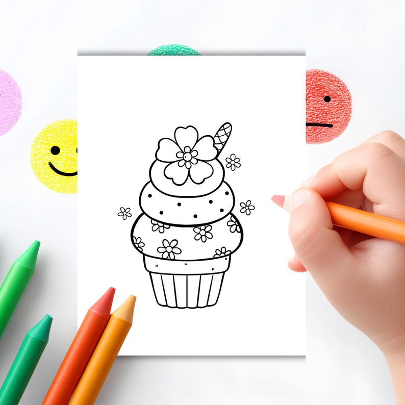 K&ouml;nnte beinhalten: Eine Schwarz-Wei&szlig;-Strichzeichnung eines Cupcakes mit floralen und Punkt-Details. Der Cupcake befindet sich auf einem wei&szlig;en Papier, mit einer Hand, die einen orangefarbenen Marker h&auml;lt. Smiley-Aufkleber und Buntstifte befinden sich im Hintergrund.