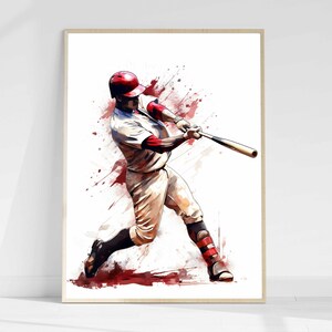 May include: A watercolor painting of a baseball player in a white uniform with red accents, swinging a wooden bat. The player is wearing a red baseball cap and is in mid-swing, with a splash of red and brown watercolor behind them.