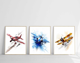 May include: Three watercolor paintings of airplanes. The first painting is of a red and white airplane with a brown and white background. The second painting is of a blue and white airplane with a blue and white background. The third painting is of a yellow and red airplane with a brown and white background.