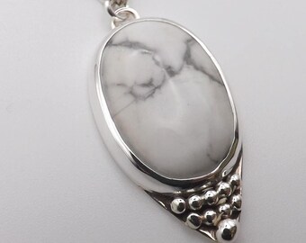 Sterling Silver natural Howlite Pendant: Handmade oval Artisan piece