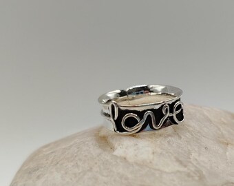 Handmade Sterling Silver Open Ring: Unique calligraphic "love" sign