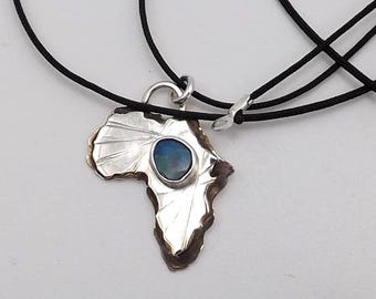 Sterling silver unique pendant Africa themed, with natural Opal, a handmade Artisan Piece!