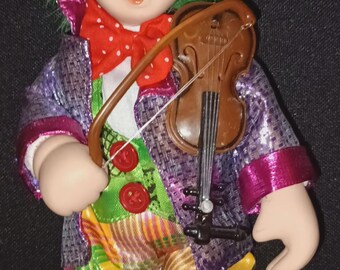 Muñeco payaso de porcelana vintage con violín