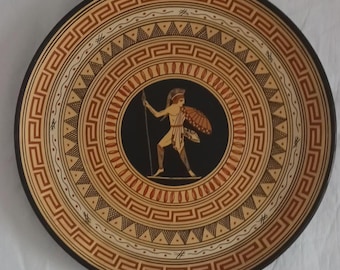 Placa mural con reproducción de un antiguo motivo griego. "Nikos"