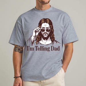 funny jesus shirt, telling dad tee, jesus meme shirt, christian humor, faith meme shirt, jesus tee men, bible joke shirt, god is dad shirt, church youth tee, gospel meme tee, religious humor, savior shirt gift, christian dad tee