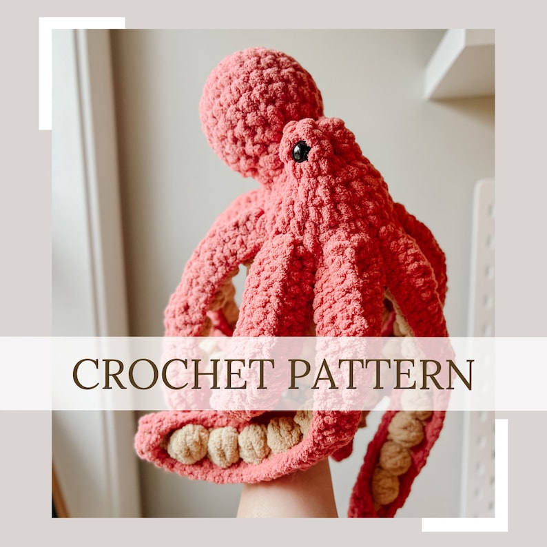 May include: Crochet pattern for a pink octopus amigurumi toy with brown eyes and beige tentacles. The octopus is being held up by a hand.