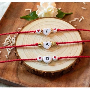 Personalized Initial Rakhi Heart Charm Letter Rakhi Unique Handmade Cotton Thread Rakhi for Brother Letter Rakhi Bracelet Custom Kids Rakhi