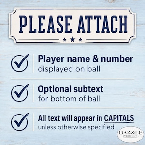May include: A rectangular sign with a white background and dark blue text reading PLEASE ATTACH. Below are three checkmarks with text: Player name & number displayed on ball, Optional subtext for bottom of ball, and All text will appear in CAPITALS.