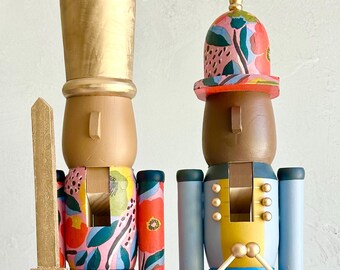 Handpainted Red Floral Nutcracker Set with Melanated Features – Wooden Christmas Mantel Decor (2 Pieces)