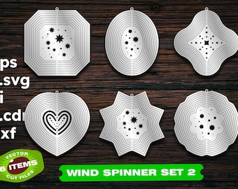 May include: Set of six wind spinners with various geometric designs. Each spinner features a different pattern of stars, hearts, or circles. The spinners are made of metal and have a silver finish.