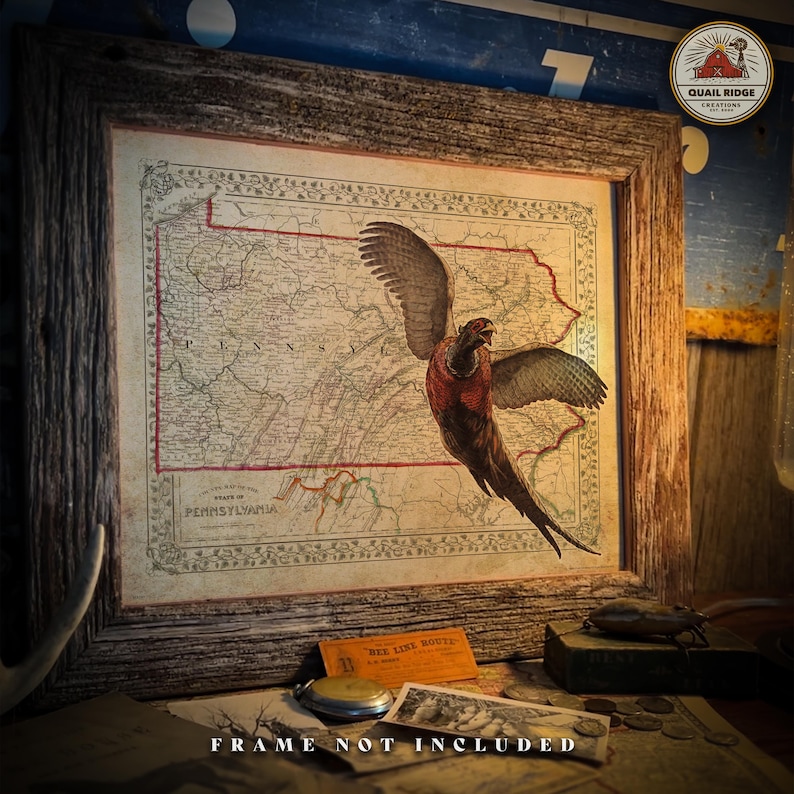 May include: A vintage map of Pennsylvania with a pheasant flying over it. The map is framed in a rustic wooden frame. The text "FRAME NOT INCLUDED" is printed below the frame.