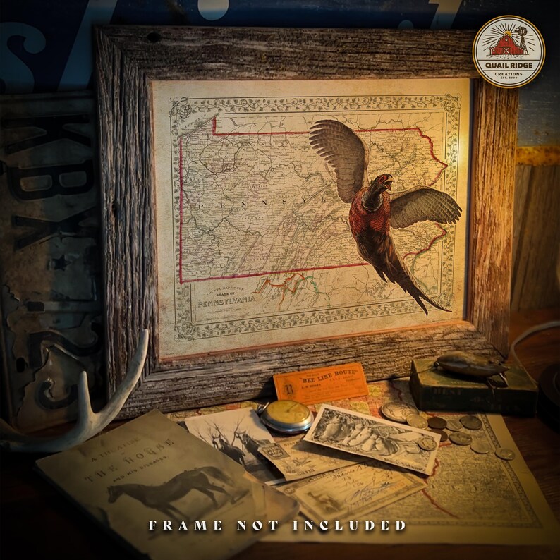 May include: A vintage map of Pennsylvania with a pheasant flying over it. The map is framed in a rustic wooden frame. The image includes the text "State of Pennsylvania" and "Quail Ridge Creations".