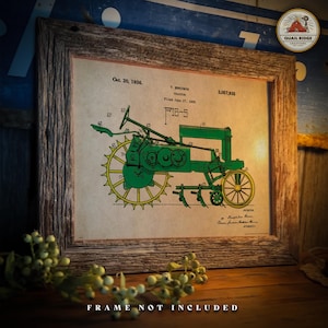 May include: A vintage patent drawing of a green tractor with the title "T. Brown Tractor" and patent number "2,057,935". The patent date is October 20, 1936. The drawing is on a beige background and framed in a rustic wooden frame.