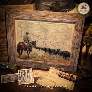 May include: A vintage-style print of a cowboy riding a horse with a herd of cattle in the background. The print is framed in a rustic wooden frame. The print features a map of the state of Minnesota.