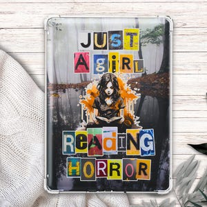 May include: A rectangular metal sign with the text "JUST A GIRL READING HORROR" in colorful block letters. The image features a girl reading a book in a forest setting, with an orange and black color scheme.