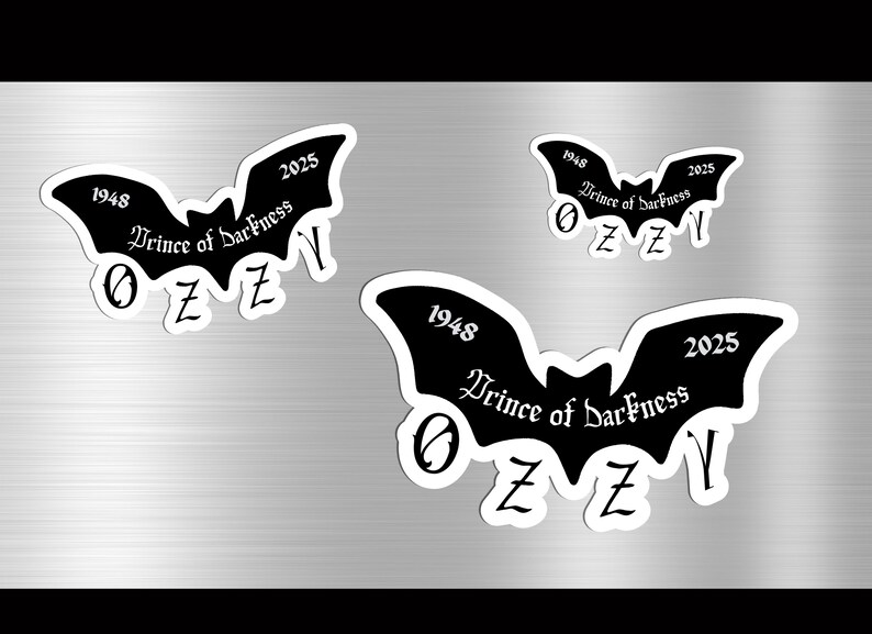 May include: Black bat-shaped stickers with white borders, featuring the text "Prince of Darkness," "1948," "2025," and the letters "OZZY." The stickers vary in size and are displayed on a metallic surface.
