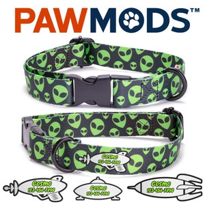 May include: A green and black dog collar with a repeating pattern of alien faces. The collar has a black buckle and a black D-ring. The collar is shown with a personalized tag that says "COSMO 123-456-7890" and features a spaceship design.