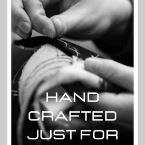 May include: Black and white photograph of a hand carefully stitching fabric. The text "HAND CRAFTED JUST FOR YOU" is superimposed on the image.
