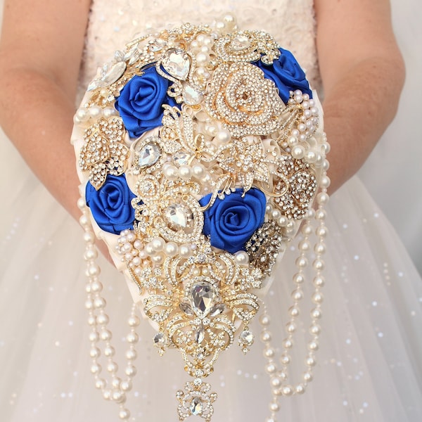 Royal blue wedding bouquet. Brooch bouquet. Cascading gold jeweled bouquet