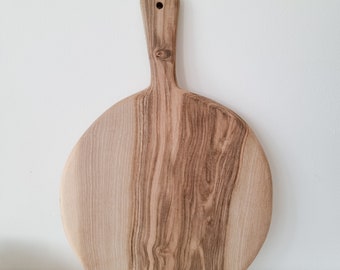 Round walnut wood cutting board
